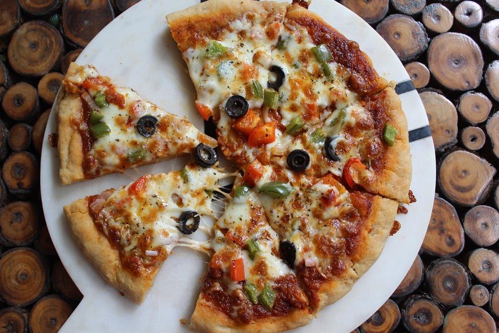 Homemade Pan Pizza With Perfectly Crispy Crust Recipe by Archana's
