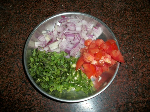 onions, tomatoes, coriander leaves and green chillies chopped