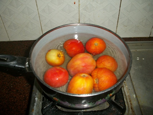 blanch the tomatoes in hot water