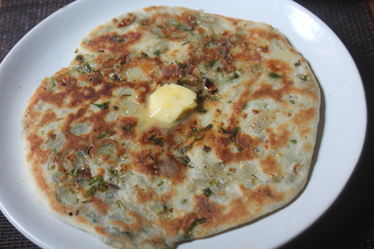 serve aloo kulcha with butter