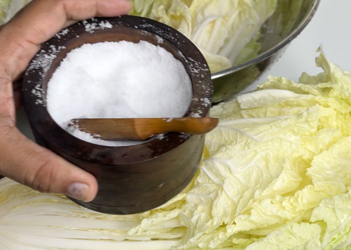 sprinkle salt over cabbage