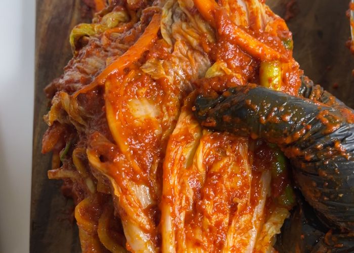 naoa cabbage covered with kimchi paste