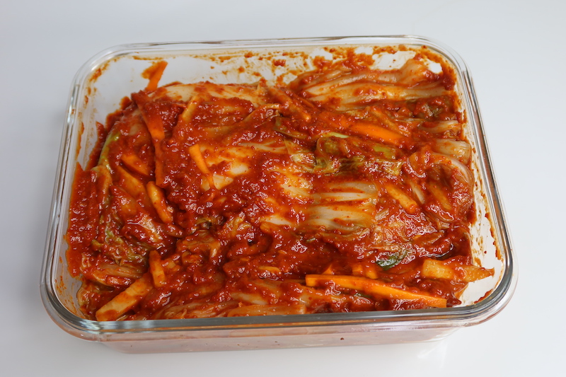 place kimchi in a container