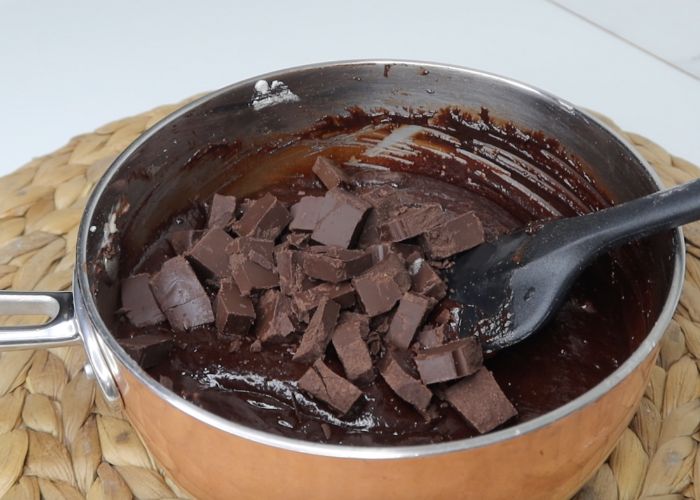 add chocolate chunks into eggless brownie batter