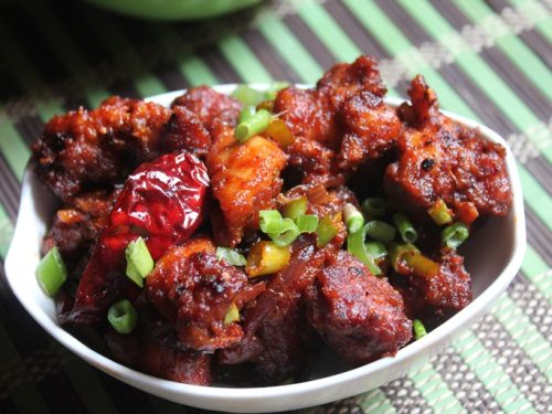 https://www.yummytummyaarthi.com/wp-content/uploads/2023/03/chilli-chicken-dry-1-500x375.jpeg